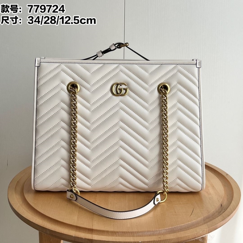 G*u*i shopping bags